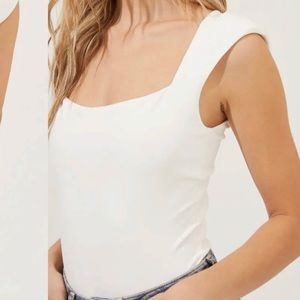NWT - WHITE ASTR BODYSUIT - size M